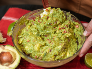 mixing guacamole ingredients